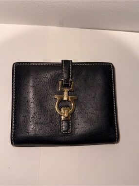 Salvatore Ferragamo Black Leather Bifold Wallet with Gold Buckle